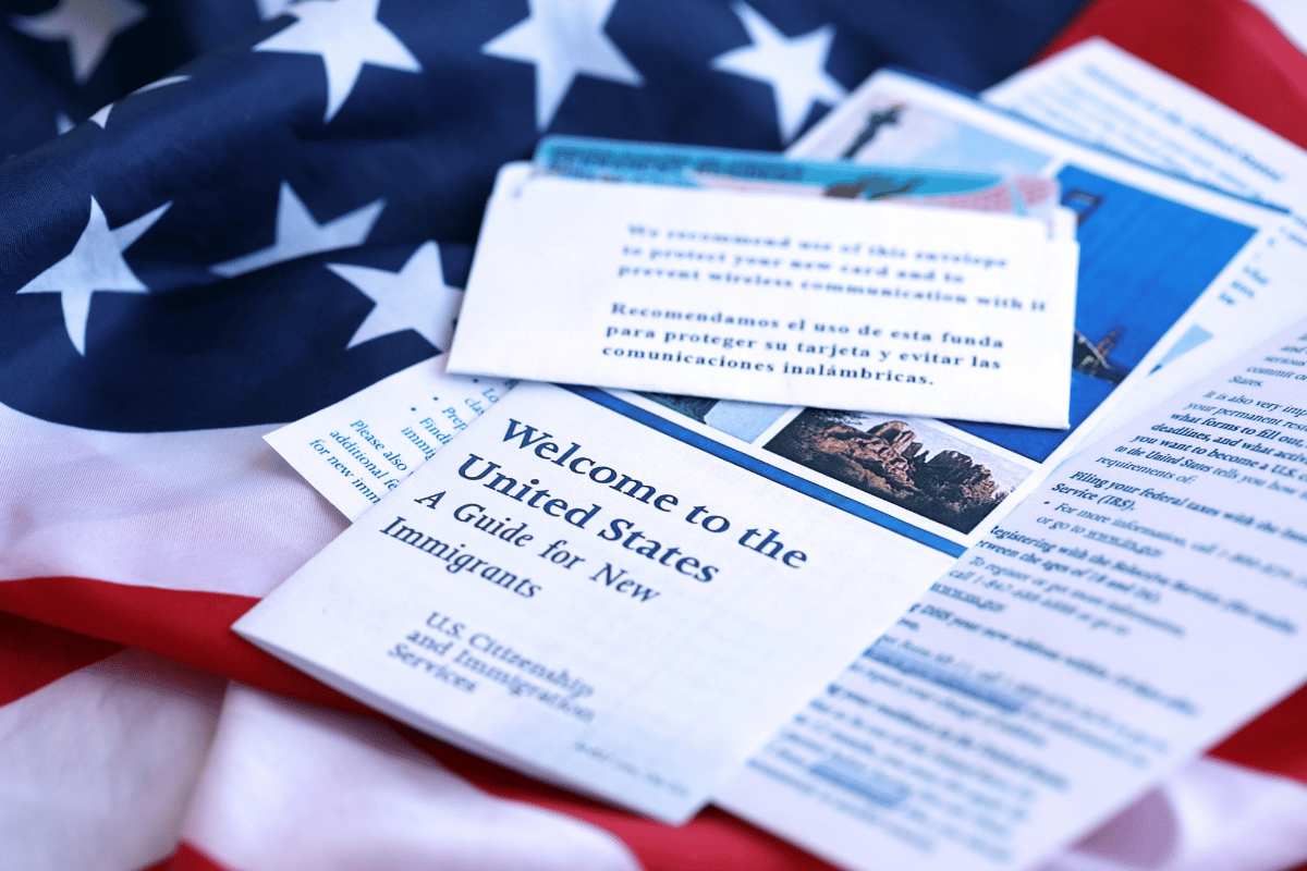 A stack of new immigrant papers